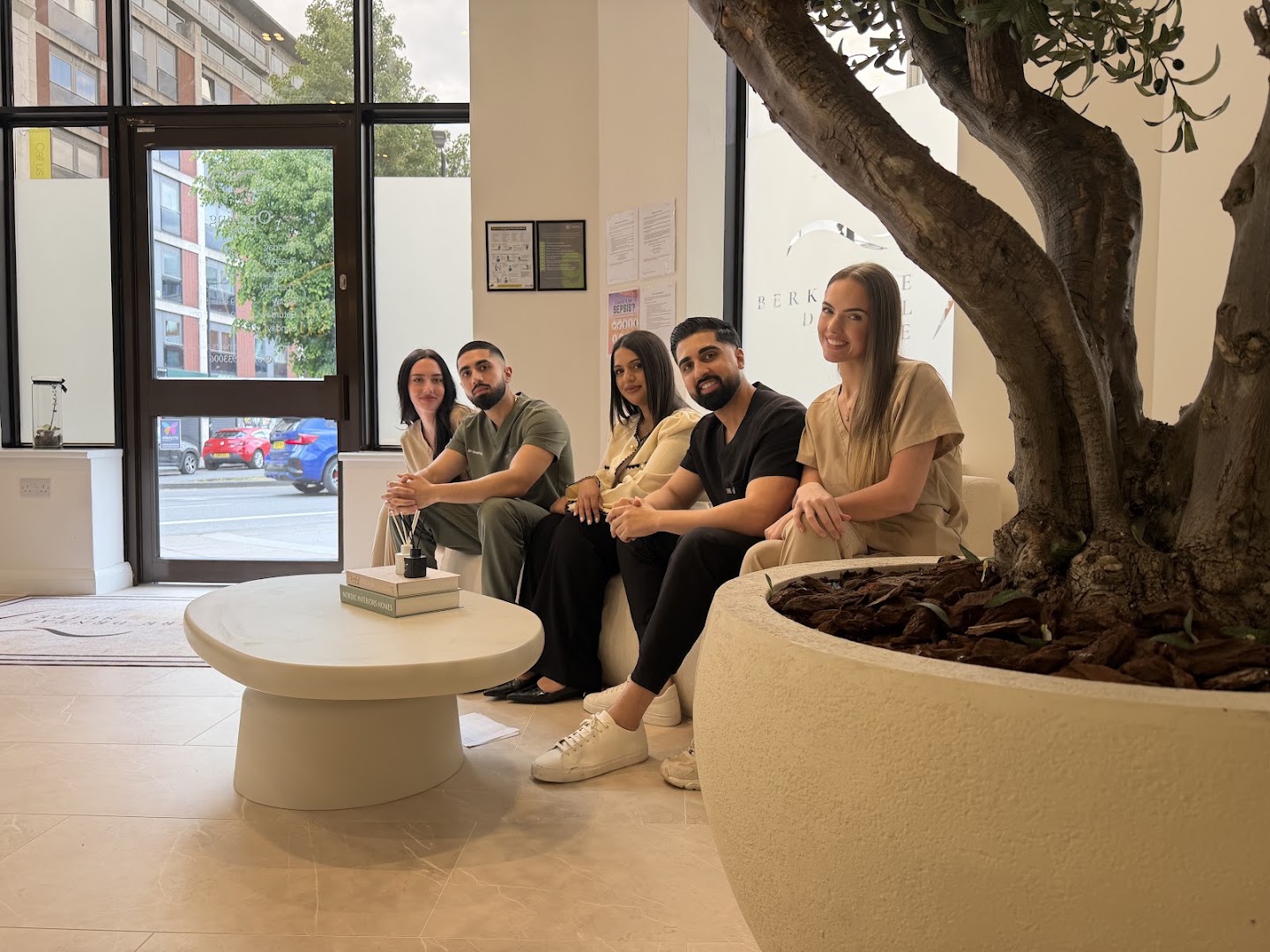 Ismael and the BDS team sitting together in the practice reception